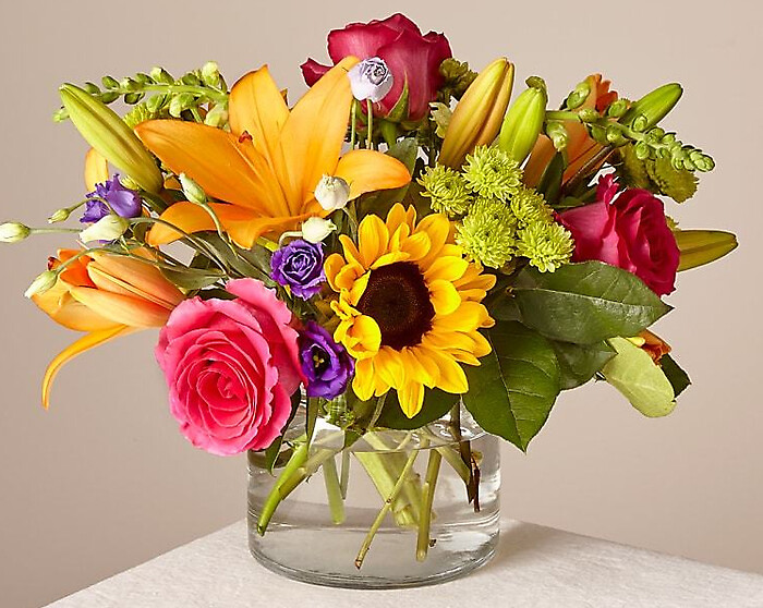 Mixed Brights Designers Choice in a Clear Vase