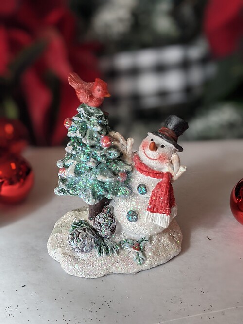 Small snowman and tree