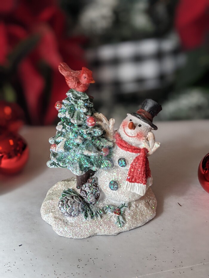 Small snowman and tree